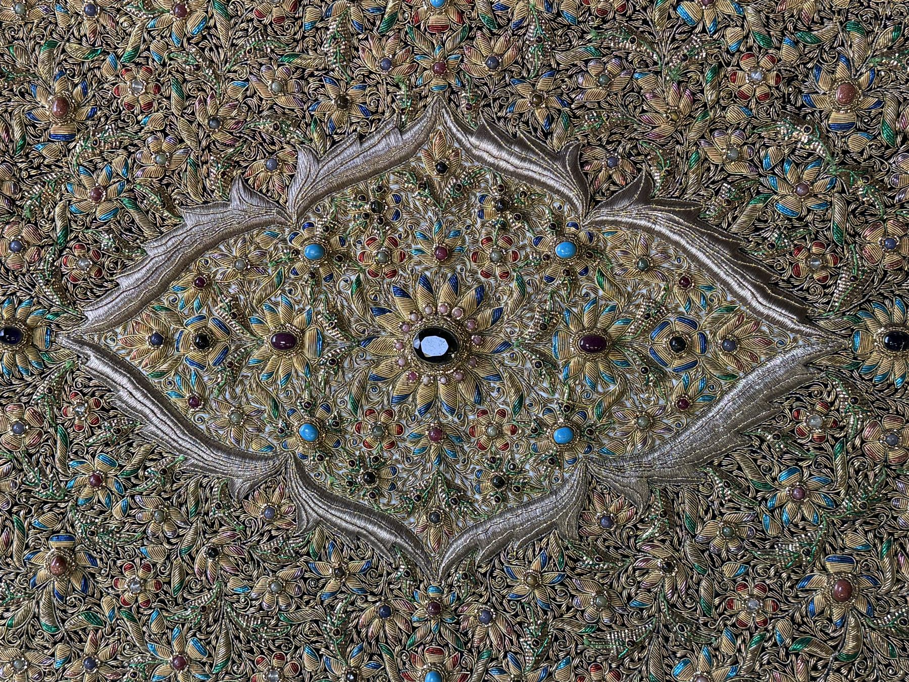 20th century large Zardozi wall hanging, hand embroidered in gold thread on black velvet ground with semi-precious stones and central medallion  149x93cm