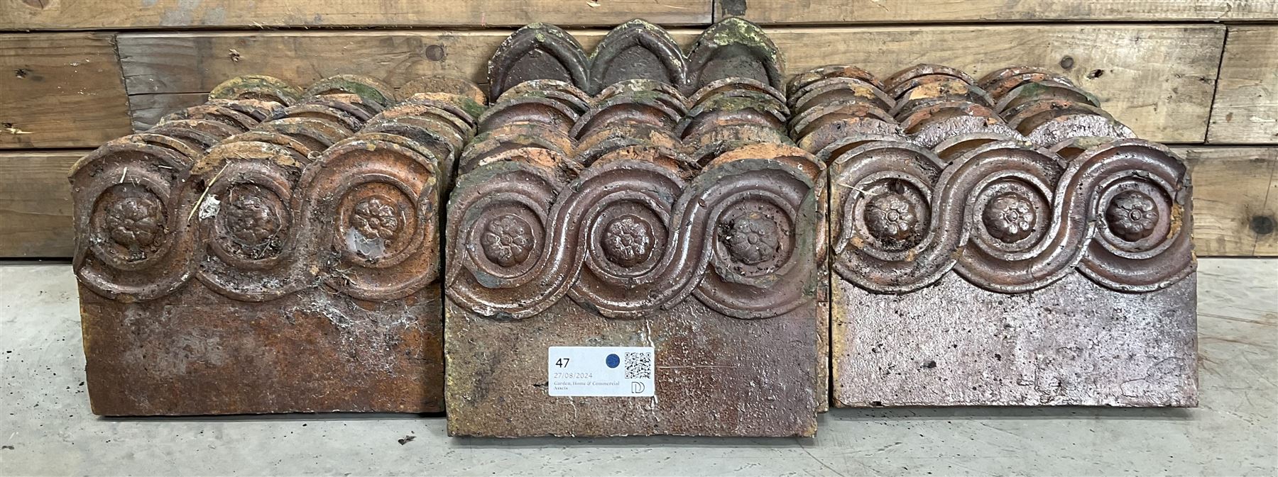 Twenty six Victorian terracotta edging tiles
