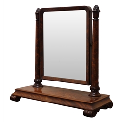  William lV figured mahogany toilet mirror, upright rectangular plate on tapering column supports with lotus carved finials, moulded platform base on scroll feet, W71cm, H71cm, D30cm  