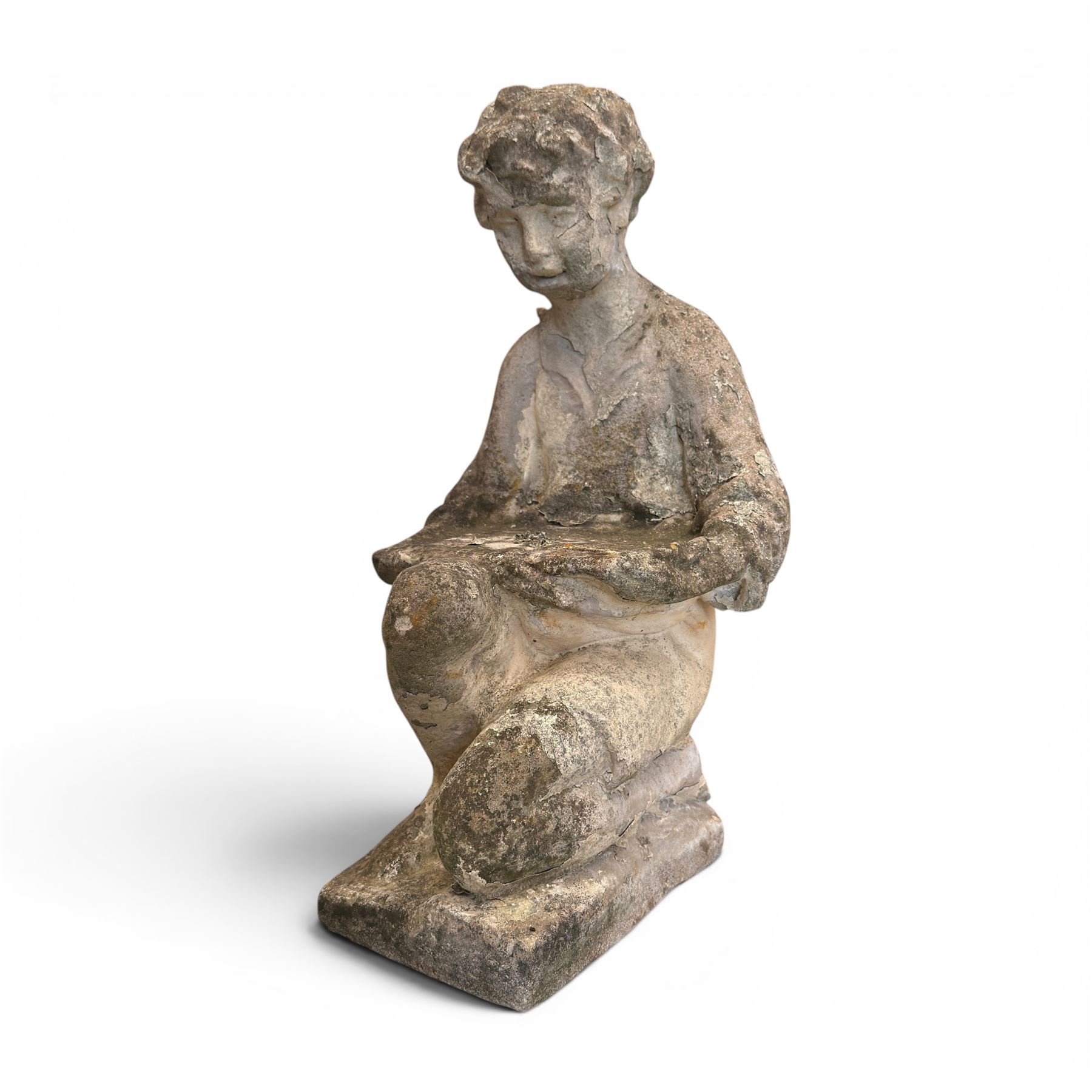 Two composition stone garden figures, comprising a seated boy figure and a standing classical draped female figure, each on square base, weathered painted finish.