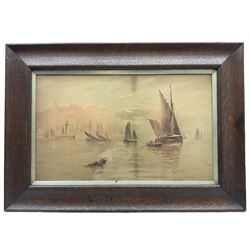 Joseph Eaman (British 1853-1907): Boats in Scarborough South Bay, oil on canvas signed 25cm x 42; Robert Clarkson (British 1857-1924): North Bay Scarborough, watercolour signed 19cm x 29cm (2)