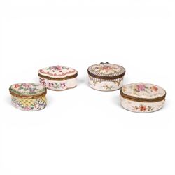 Four 19th century and later pill boxes, each decorated to the lid with floral sprigs, H3cm