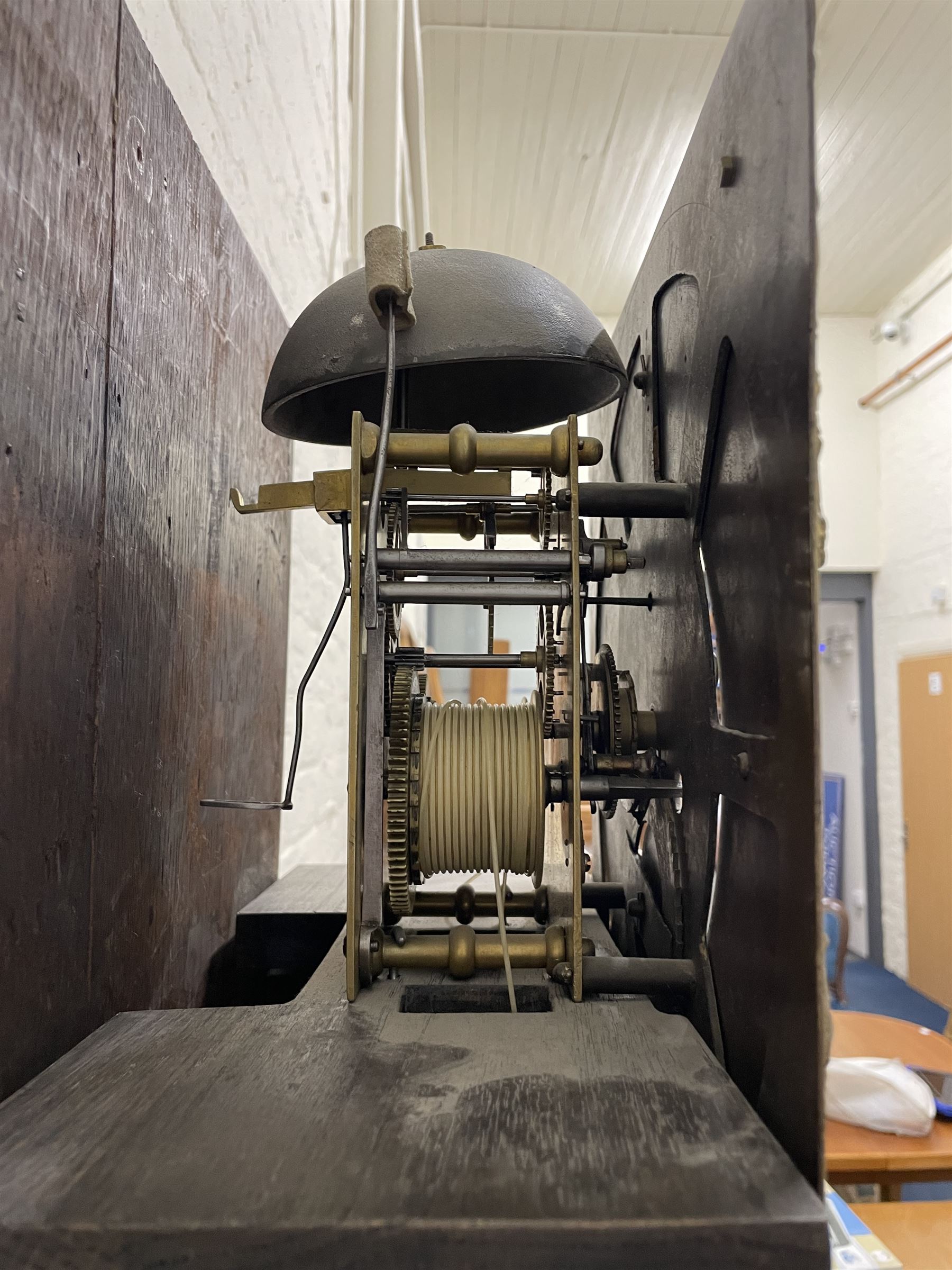 William Watson of  Blackburn (Lancs)  - late 18th century 8-day oak and mahogany cross banded longcase clock, with a flat top and open fretwork above, deep cornice with dogtooth moulding and frieze beneath, square hood door flanked by reeded pilasters with brass capitals, trunk with  reeded quarter columns, long trunk door with concave corners on a plinth with canted corners on bracket feet, brass dial with cast brass spandrels, broad silvered chapter ring with Roman numerals and five-minute Arabic's, a profusely engraved and silvered dial centre with seconds dial, matching steel hands and calendar aperture, hourly rack striking movement with a recoil anchor escapement. With weights, pendulum and key. 
William Watson of Northgate, Blackburn, is recorded as working c1770-1814 . As with this clock Watson frequently signed some of his clocks without a placename.