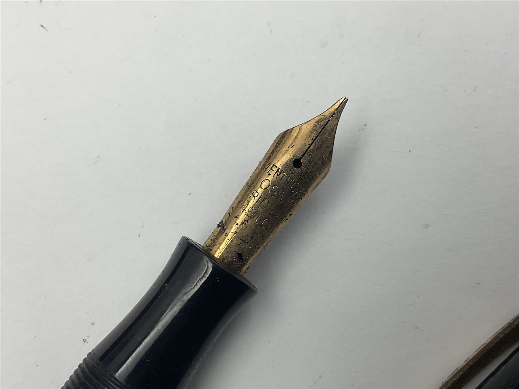 Circa 1930s Mentmore Auto Flow button fill fountain pen, the black barrel and cap with single narrow band and gold nib stamped Osmi Ridium 14ct, together with two gold nib fountain pens, each marked Huahong, the first stamped 14K 580, and second stamped 8K, both housed in Mentmore boxes (3)