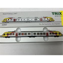 Trix Minitrix 'N' gauge - No.12363 'LINT' Diesel Powered Rail Car 'bendy' train; boxed; and No.11411 DB Zugset 'Danzas' goods set; boxed (2)