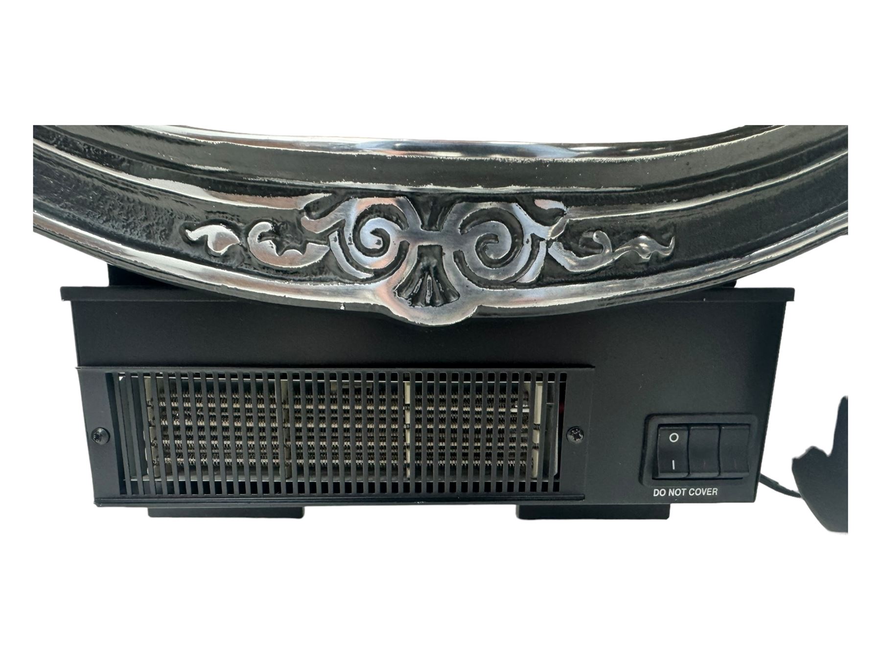 Stained glass and cast iron electric fireplace, arched top with decorative finials, stained glass front panel with floral motifs, flanked by cast iron scrolls, raised on scroll supports