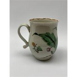 18th century porcelain mug, of baluster form hand painted with strawberry, yellow flowers, and dragonfly, the loop handle and inner rim detailed with red feathering, H11cm 