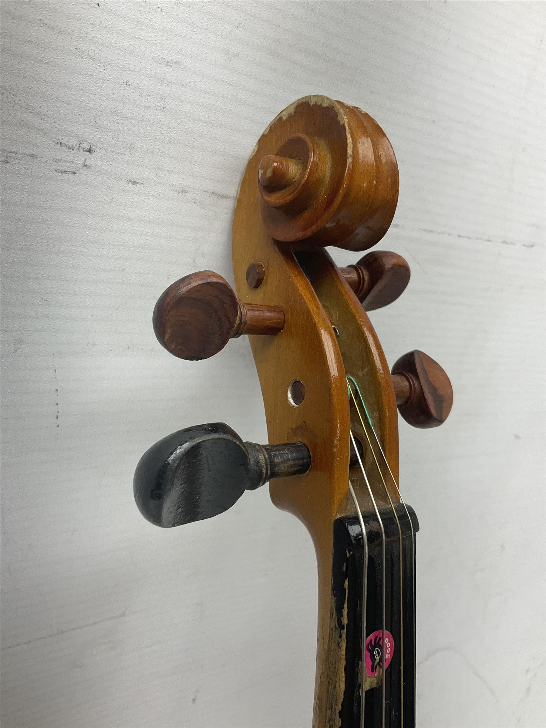 Four Chinese graduated violins - full size with 35.5cm two-piece back; three-quarter size with 33.5cm two-piece back; half size with 31cm two-piece back; and quarter size with 27.5cm two-piece back; all cased except full size; one with bow (4)