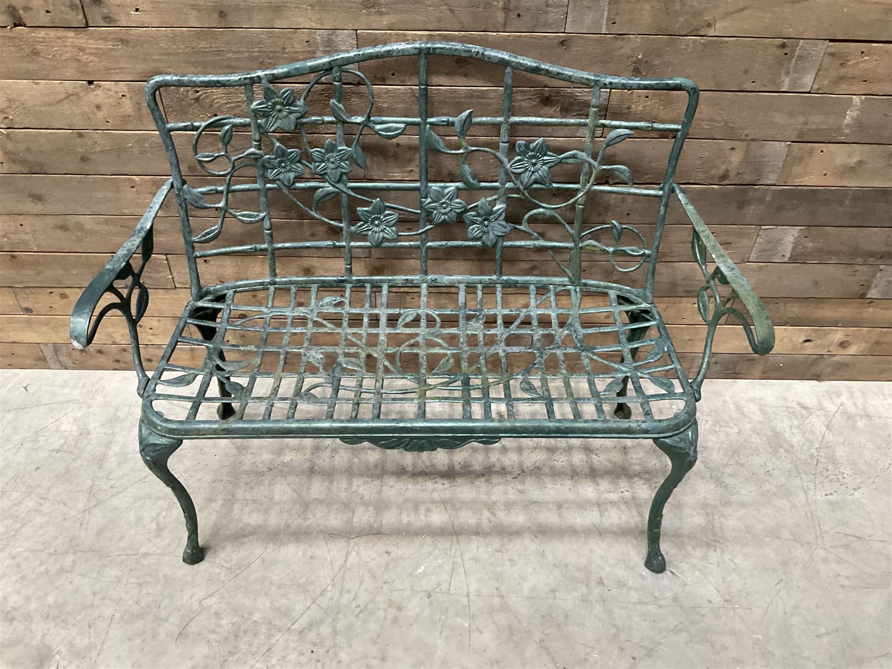 Cast aluminium garden dining set, comprising ornate circular table (D91cm, H68cm) a two seater bench, on cabriole supports (W118cm, H93cm, D55cm), and two matching armchairs (W55cm, H95cm, D54cm)