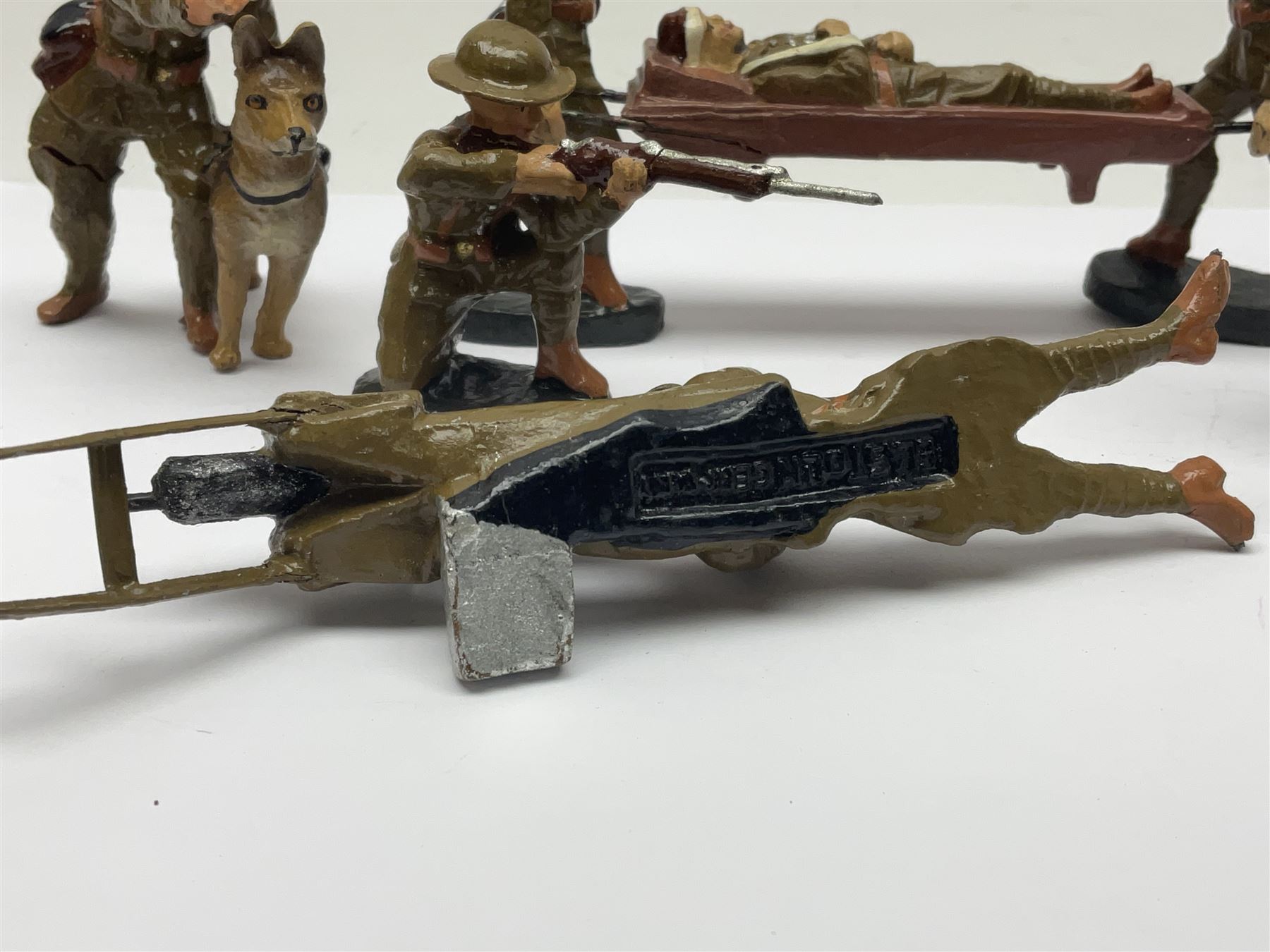 Eight Elastolin British soldiers and wartime figures, including nurse, injured soldier on stretcher, soldier with dog, etc, tallest 11cm