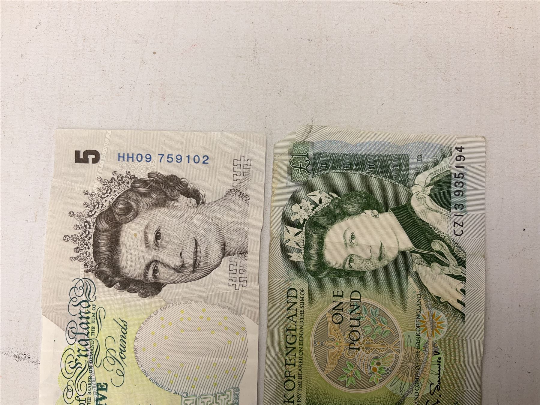 Coins and banknotes, including Lowther mis-printed five pound note 'HH09', Somerset one pound note 'CZ13', United States of America 1971 and 1976 one dollar coins, Great British commemorative crowns, Queen Elizabeth II 1997 two pound coin, 2008 five pound coin, King George V 1920 and 1931  florins and various other pre-decimal coins