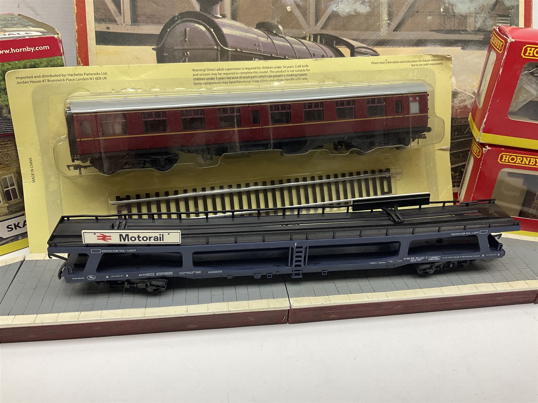 Tri-ang/Hornby '00' gauge - RS.606 Express Goods Set; boxed; eleven passenger coaches and twelve goods wagons (some boxed) by Hornby, Lima etc; and boxed Hornby Skaledale Station Building with platform