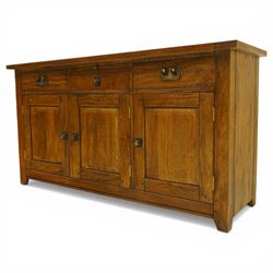 Barker & Stonehouse - 'New Frontier' mangowood wide sideboard, rectangular top with a central brushing slide above a drawer, flanked either side by a drawer, above three cupboard doors, raised on stiled supports