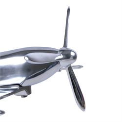 Modern polished metal model of a Spitfire, H36cm