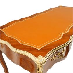 Baggio Anciens Meubles - Italian Louis XV style kingwood and gilt metal mounted bureau plat or writing desk, the shaped rectangular top with inset leather writing surface with gilt metal edge, above three shaped frieze drawers with gilt metal handles, raised on cabriole supports with gilt cartouche mounts to the knees and scroll feet