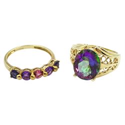 Gold oval mystic topaz ring with pierced shoulders and a gold five stone iolite, pink topaz and amethyst ring, both hallmarked 9ct