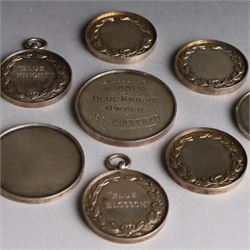 Seven 1920s Old English Sheepdog silver medals, all hallmarked, together with two further silver plated dog related medals