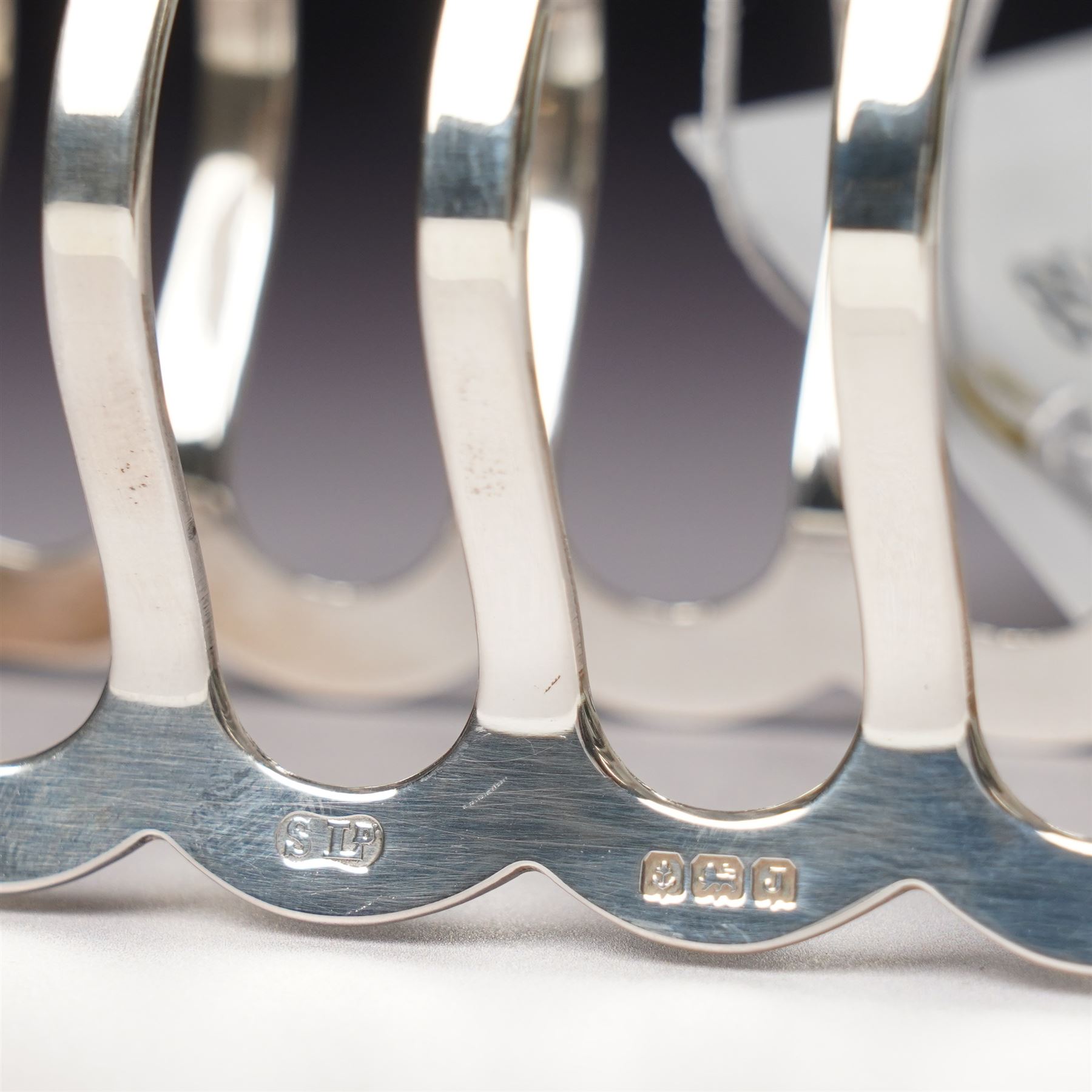 Silver six division toast rack with loop handle Birmingham 1933 Maker William Suckling Ltd