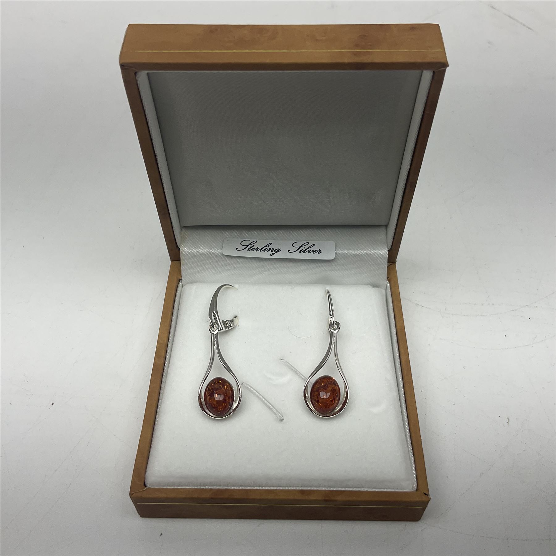Pair of silver and Baltic amber pendant earrings, stamped 925, boxed 