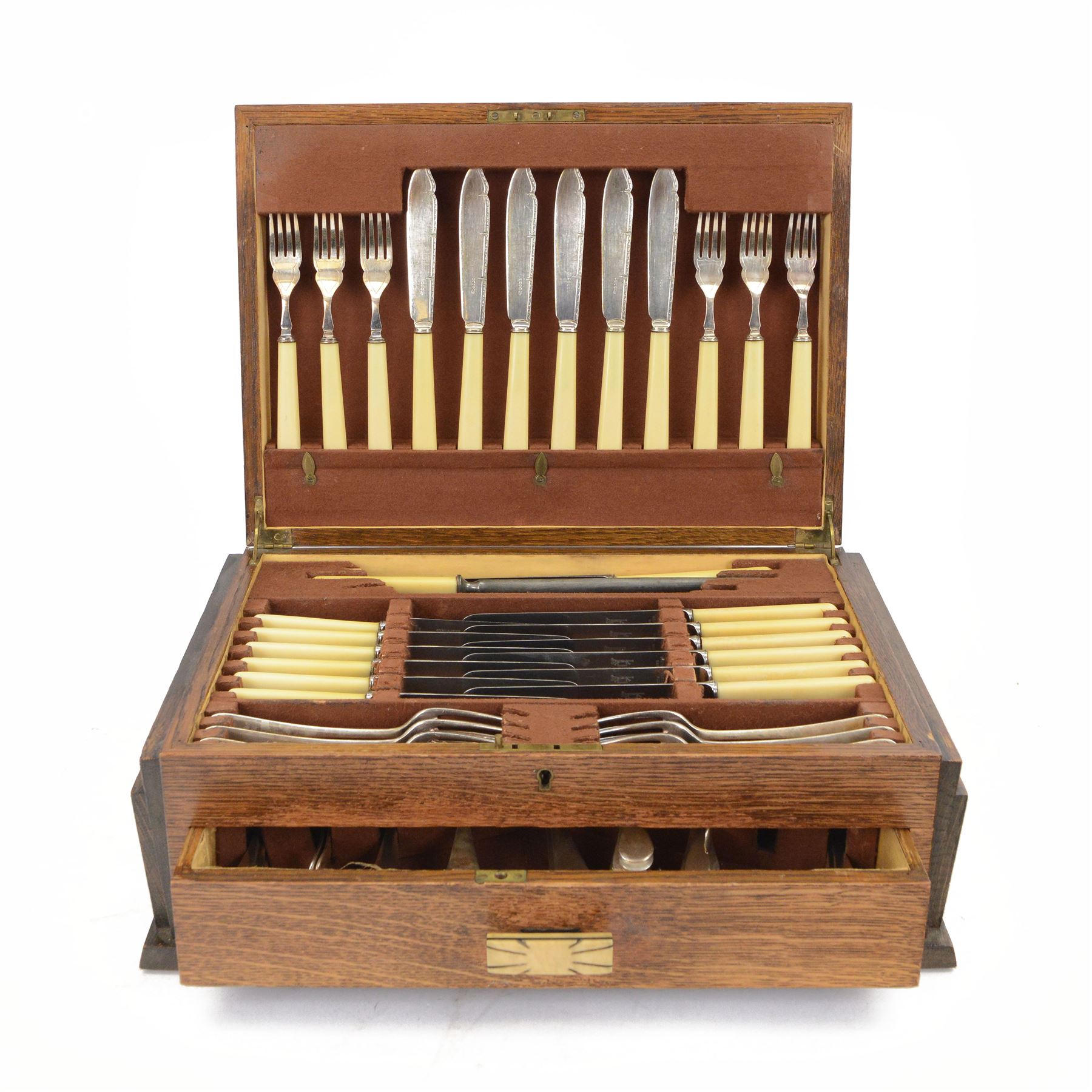 Art deco canteen of cutlery for six place settings, stainless steel with ivorine handles, contained within wooden canteen box