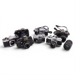 Collection of cameras, including Nikon F-301, Mamiya 135, Praktica LTL, Miranda M5-1N, Sol...