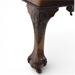 19th century mahogany extending dining table and eight chairs, rectangular top with rounded corners and additional leaves, plain frieze with carved gadrooned edge detail, raised on cabriole supports terminating in ball and claw feet, together with a set of eight mahogany dining chairs including two carvers, the chairs with curved top rails and pierced splats, upholstered drop-in seats, on turned supports

(Table extends to 312cm)