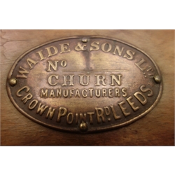  Waide & Sons Ltd Leeds, metal bound oak butter churn, on square supports with castors, W53cm, H92cm, D50cm  