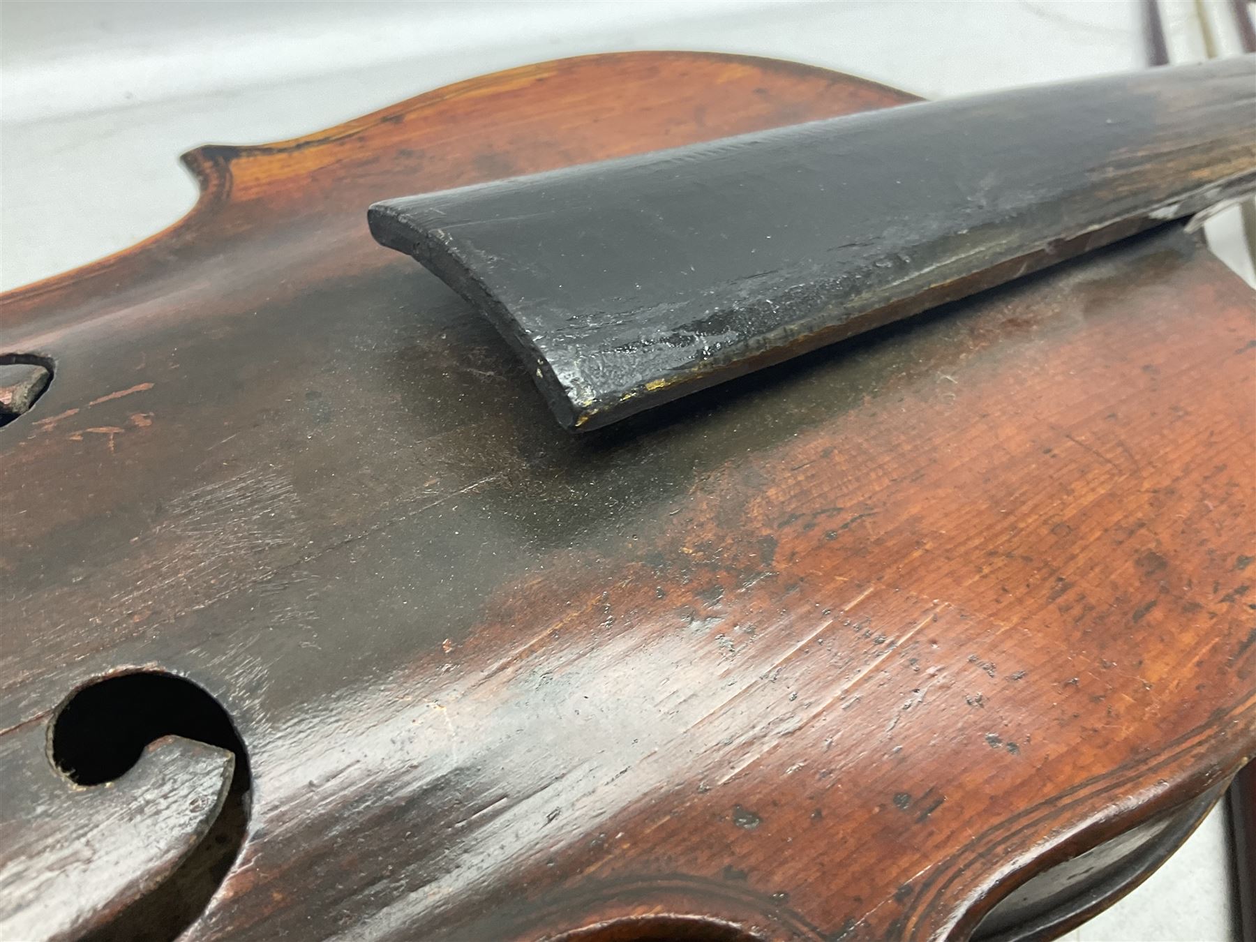 Incomplete amateur made violin c1880 for restoration and completion with 36.5cm one-piece maple back and ribs and spruce top L59.5cm; together with two brazilwood violin bows and pernambuco cello bow, all with nickel mounts (4)