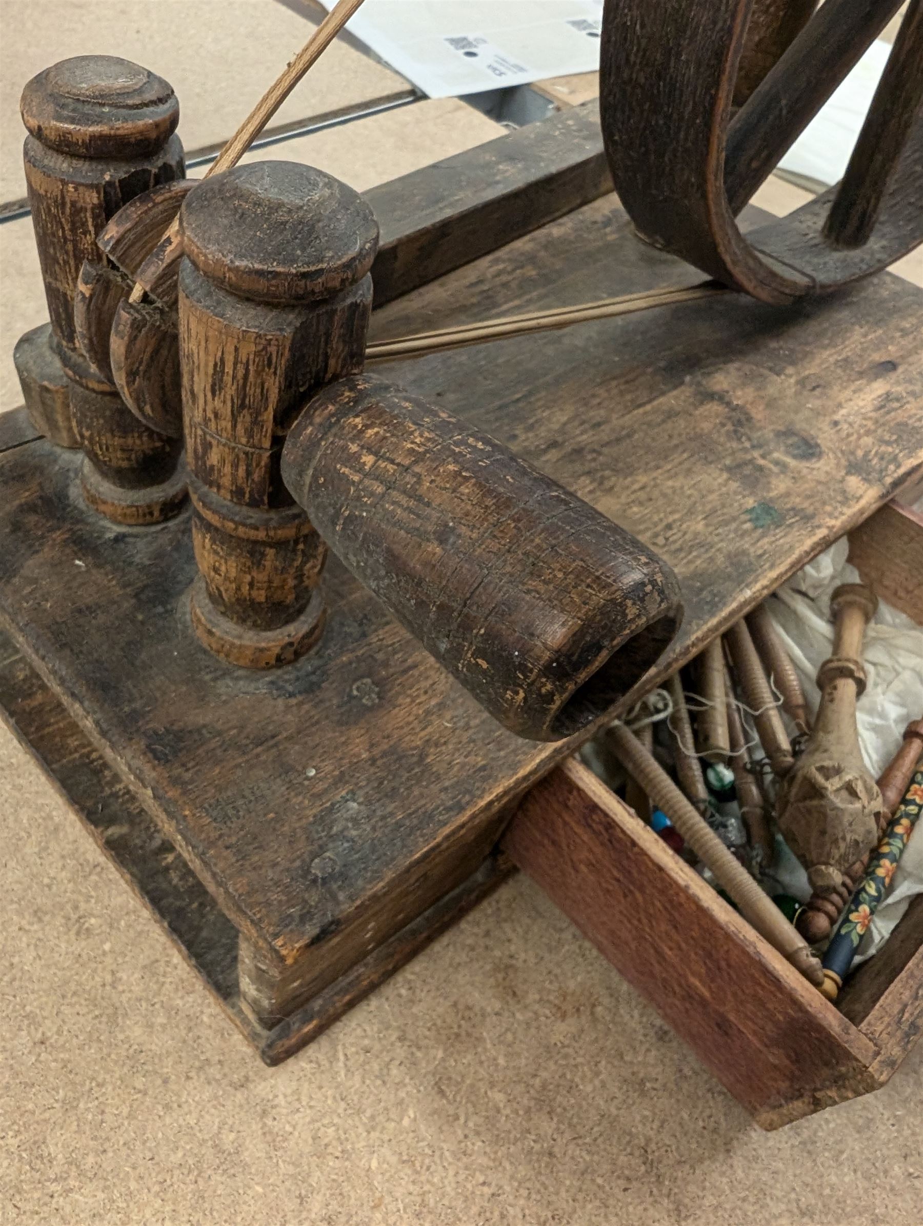 19th century table top spinning wheel, with drawer containing small selection of lace bobbins, H33cm