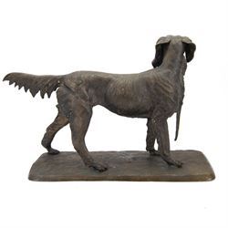 Bronze sculpture of a gundog retrieving a pheasant, finely cast with detailed coat and featherwork, mounted on a textured rectangular base