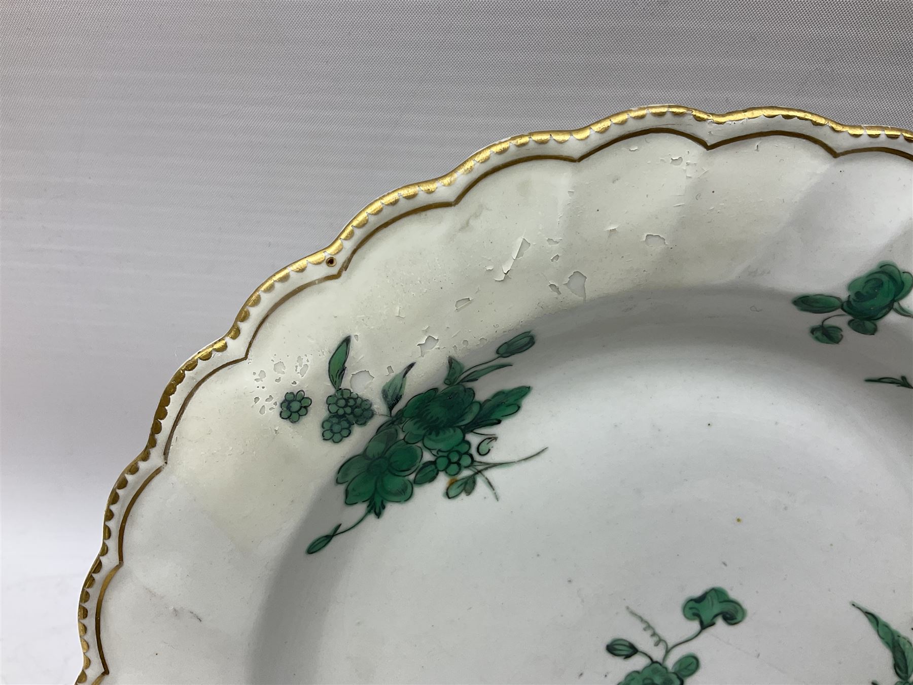 Mid 18th century Chelsea plate with gold anchor mark beneath, decorated with green floral sprays upon plain ground, the moulded cavetto shaped border with gilt rim, (A/F), D22cm, together with early 20th century Adams Tunstall Tokio pearlware slop bowl, Spode plate decorated in the Imari type pallette, with impressed and printed marks beneath, 19th century Indian Tree pattern breakfast cup and saucer, small polychrome enamelled vase and cover in the style of Samson of Paris, with marks beneath, and a pastille burner