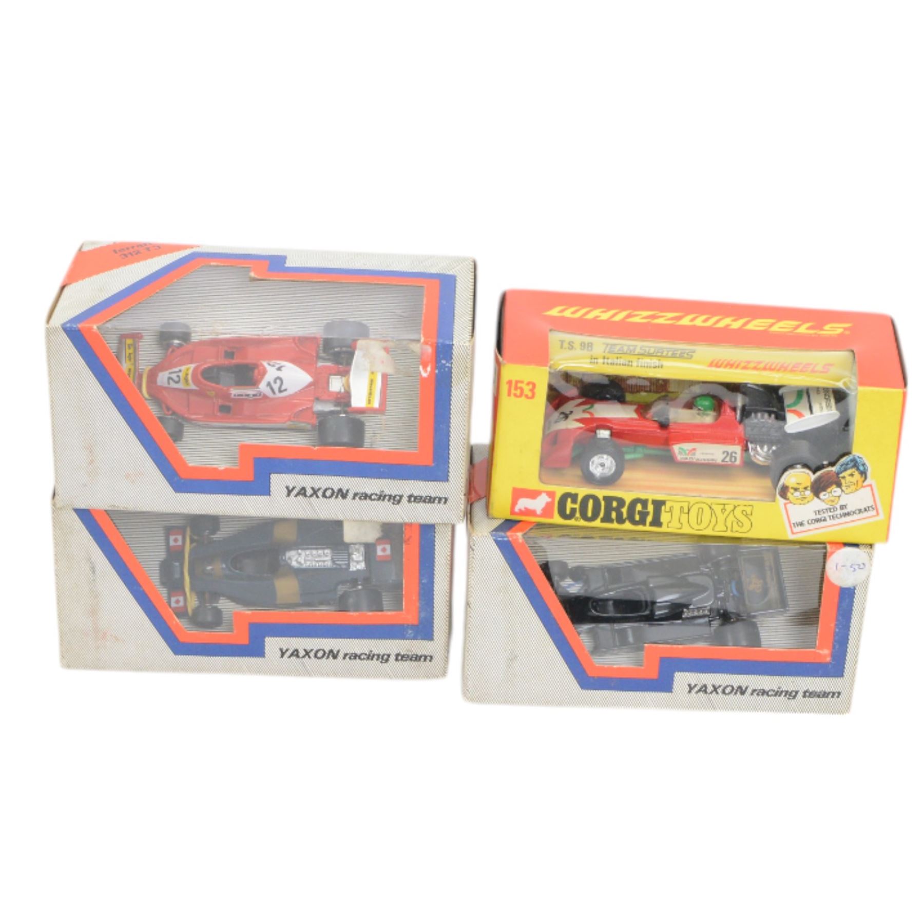Collection of diecast Formula 1 and similar racing cars, comprising 1:14 scale Burago Lotus JPSMK4, eleven Corgi examples including 154 John Player Special Lotus, 155 Shadow and 159 Patrick Eagle Racing Car and five Yaxon Racing Team examples, all boxed