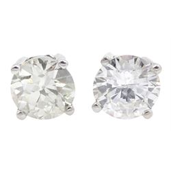 Pair of 18ct white gold round brilliant cut diamond stud earrings, hallmarked, total diamond weight approx 1.20 carat