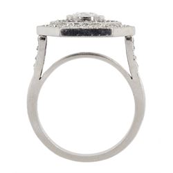Platinum milgrain set diamond and sapphire hexagonal ring, the principle diamond of approx 0.55 carat, with sapphire and round brilliant cut diamonds, hallmarked
