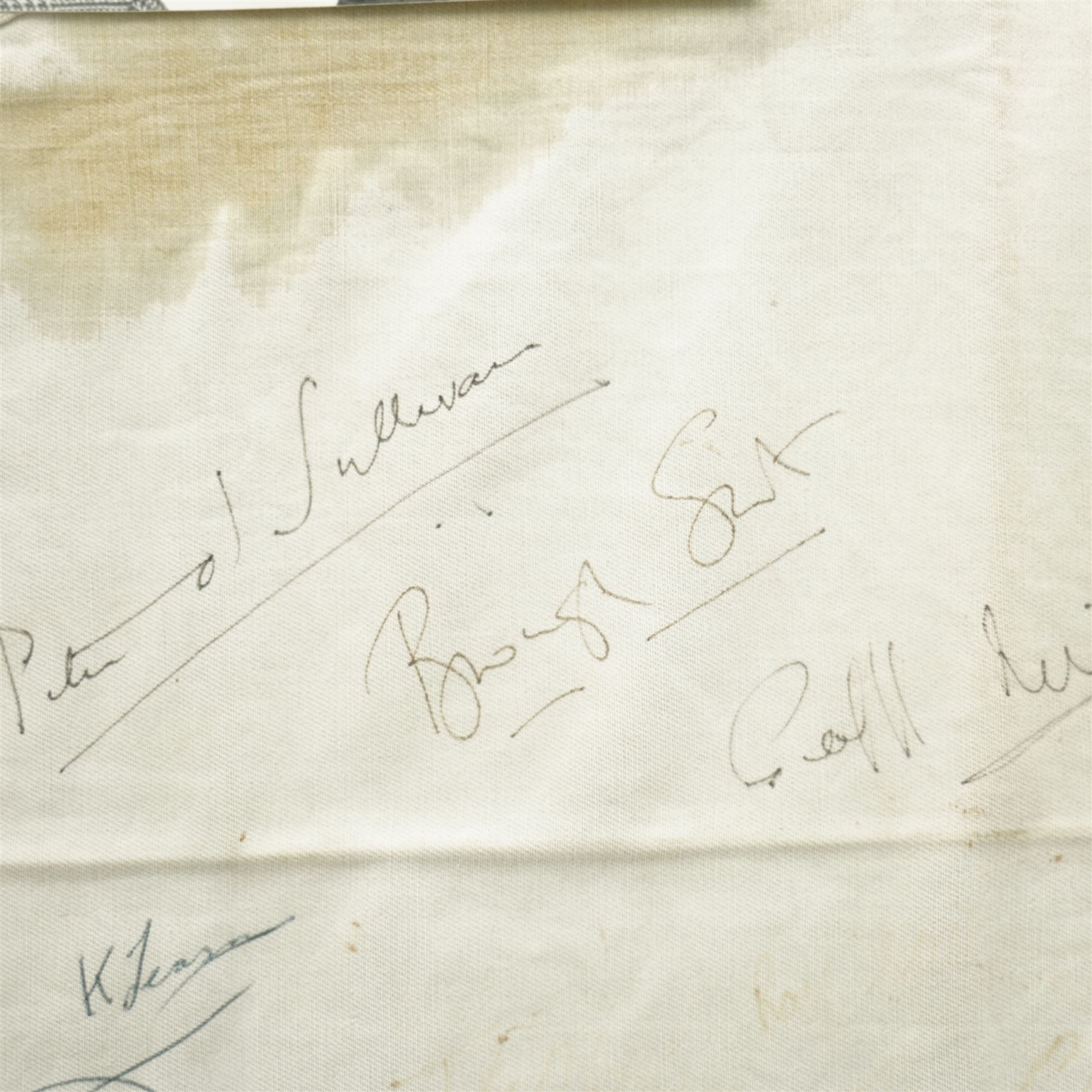 Signed saddle cloth, previously on display in the Mount Royale Hotel, York, autographed by various visiting jockeys and racing related television persons, to include Pat Eddery, Brough Scott, John McCririck, Peter O Sullivan, Willie Carson and others, frame 85cm x 69cm 