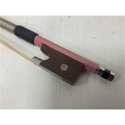 Zest full size pink violin, with a solid wood body and maple head, with matching pink bow and two further bows, in a hard case Length 60cm