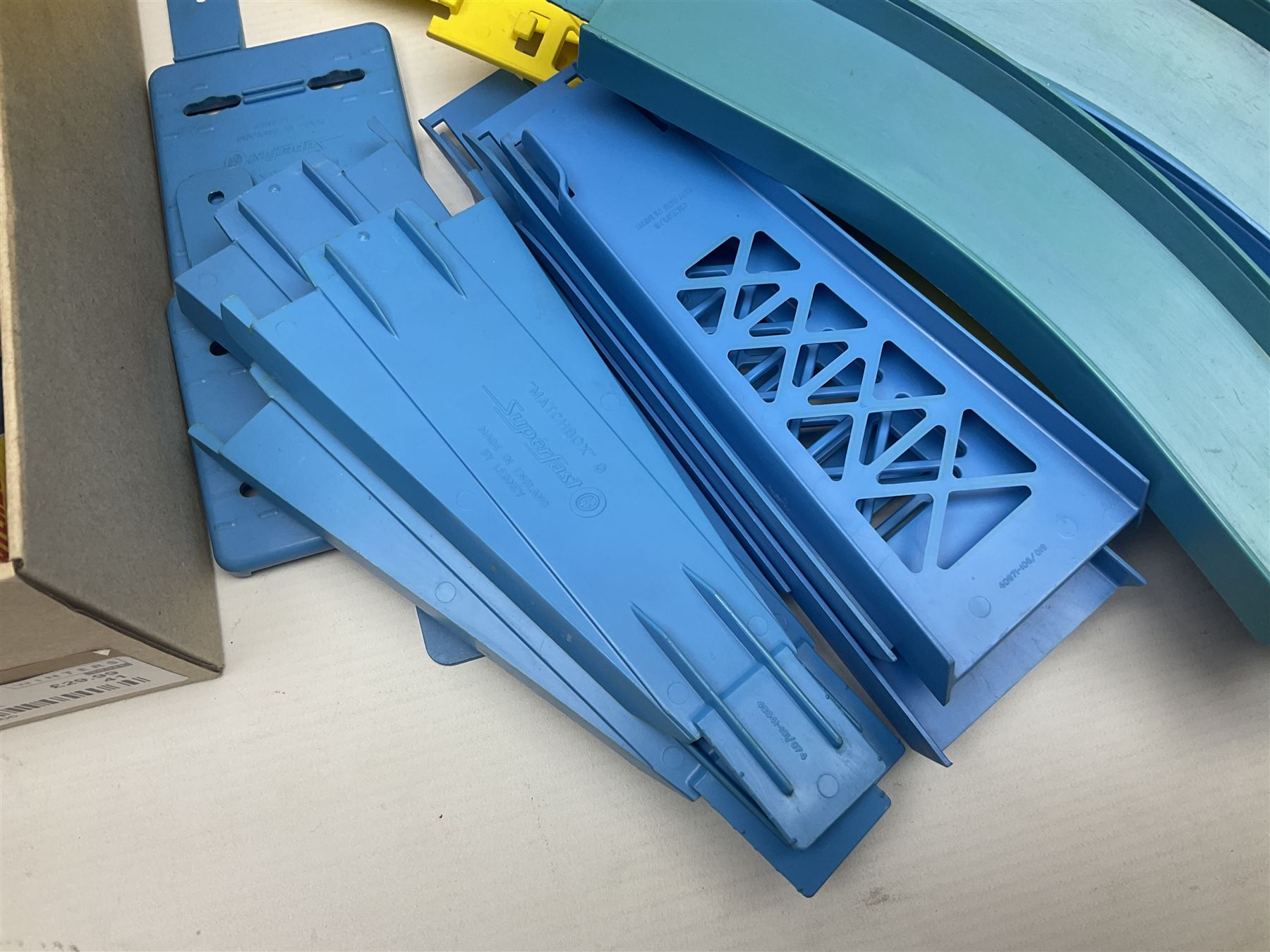 Matchbox Superfast track racing Set with Superbooster and two boxed SF-17 Slipstream Curves; together with five boxed Superfast models - 3d Monteverdi Hai, two 7d Hairy Hustler, 45c Ford Group 6 and 66d Mazda RX500; and quantity of unboxed and playworn other die-cast models