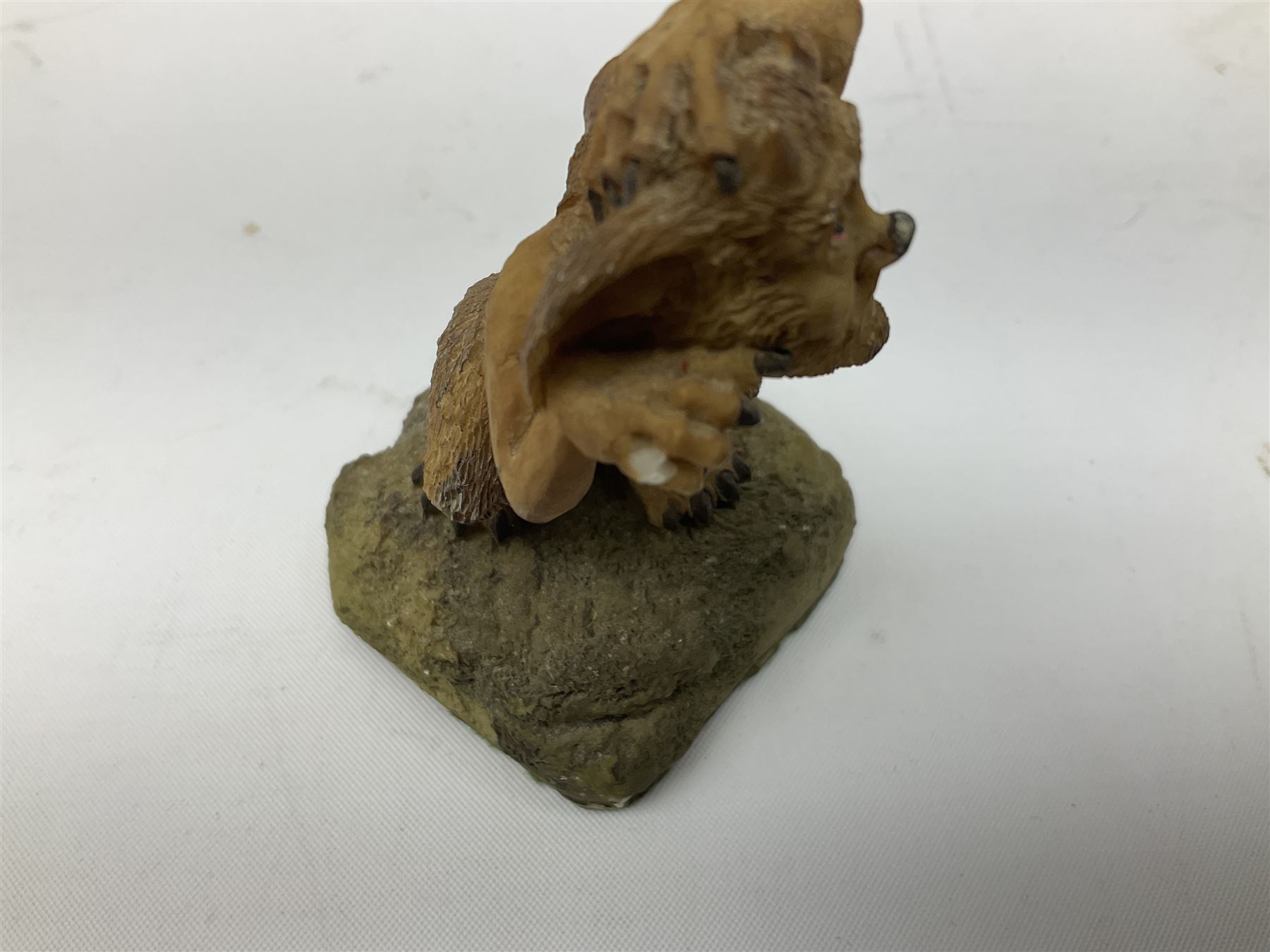 Terry Pratchett Discworld figures, comprising Roderick the hippo, DWE2, a 1995 event piece, Rincewind bookend, DW11, Death bookend, DW12, Librarians wizard knob, boxed, DW55, the luggage, boxed, DW04, tankard from the mended drum, DW21, Teppic the assassin, DW32, Greebo, DW45, Herne the hunted, DW64, Gaspode,  DW31, Quoth on skull, DW49 and Dibbler's compass DW16. 