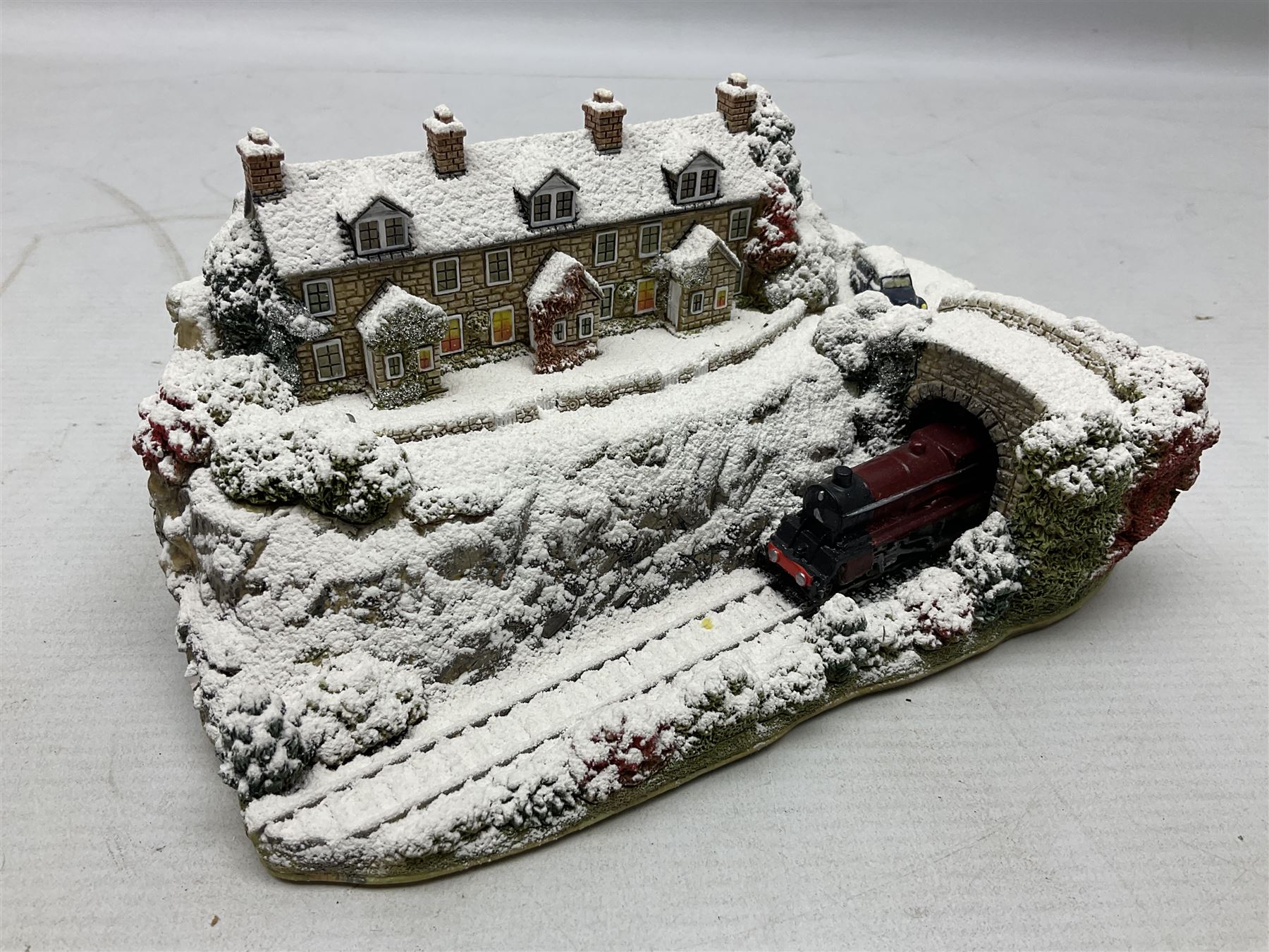 Five Lilliput Lane Illuminated Cottages, comprising Christmas is Coming, with box and deed, Christmas at Mol's, with box and deed, Christmas in Canterbury, with box and deed, Christmas Lights at Sweet Delights and The Three Kings, with box and deeds, together with twelve other Lilliput lanes, to include The First Noel, with box and deed, Winters Moonlight, Yuletide treats, with box and deed etc (17)