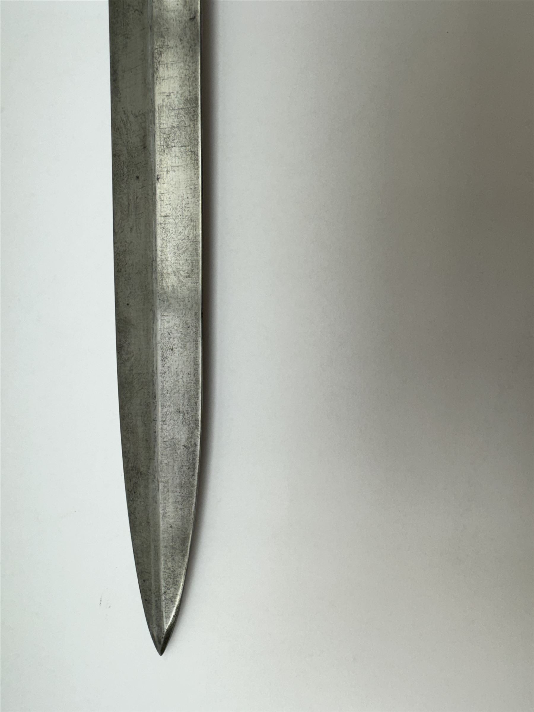 WWII Lee Metford rifle bayonet with original scabbard marked 586, with canvas frog, L44cm overall 
Notes; due to the condition of the bayonet it is possible this was issued to the home guard