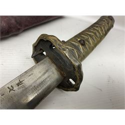 Copy of a WWII Japanese NCO sword, the 65cm slightly curving blade stamped with pseudo Japanese characters and cast brass simulated cord bound grip; in officer's leather bound field scabbard L97cm overall