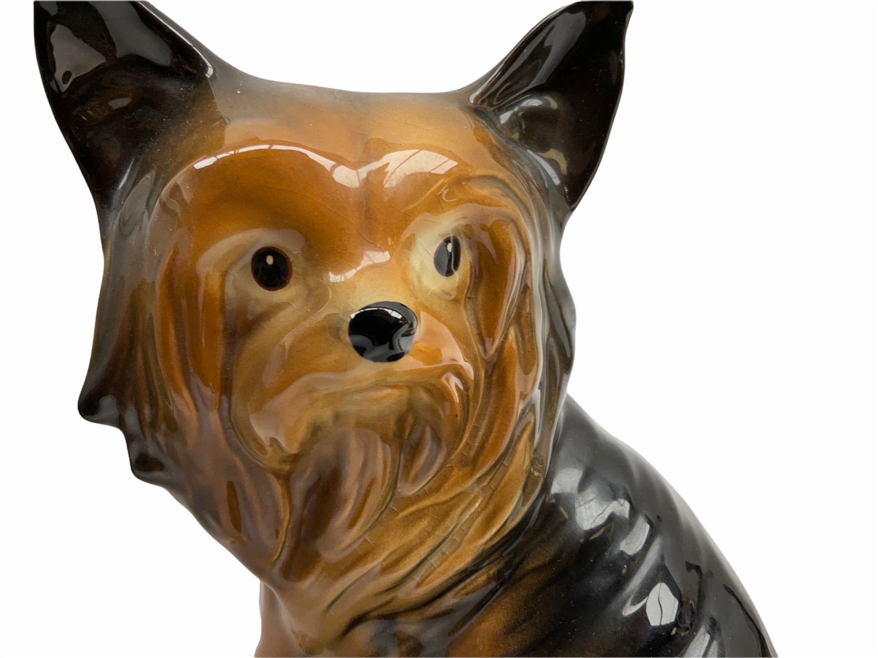 Beswick fireside Yorkshire terrier dog model no 2377 H25.5cm, together with a pair of staffordshire style white spaniels H30cm, two Mella ware terriers etc.  