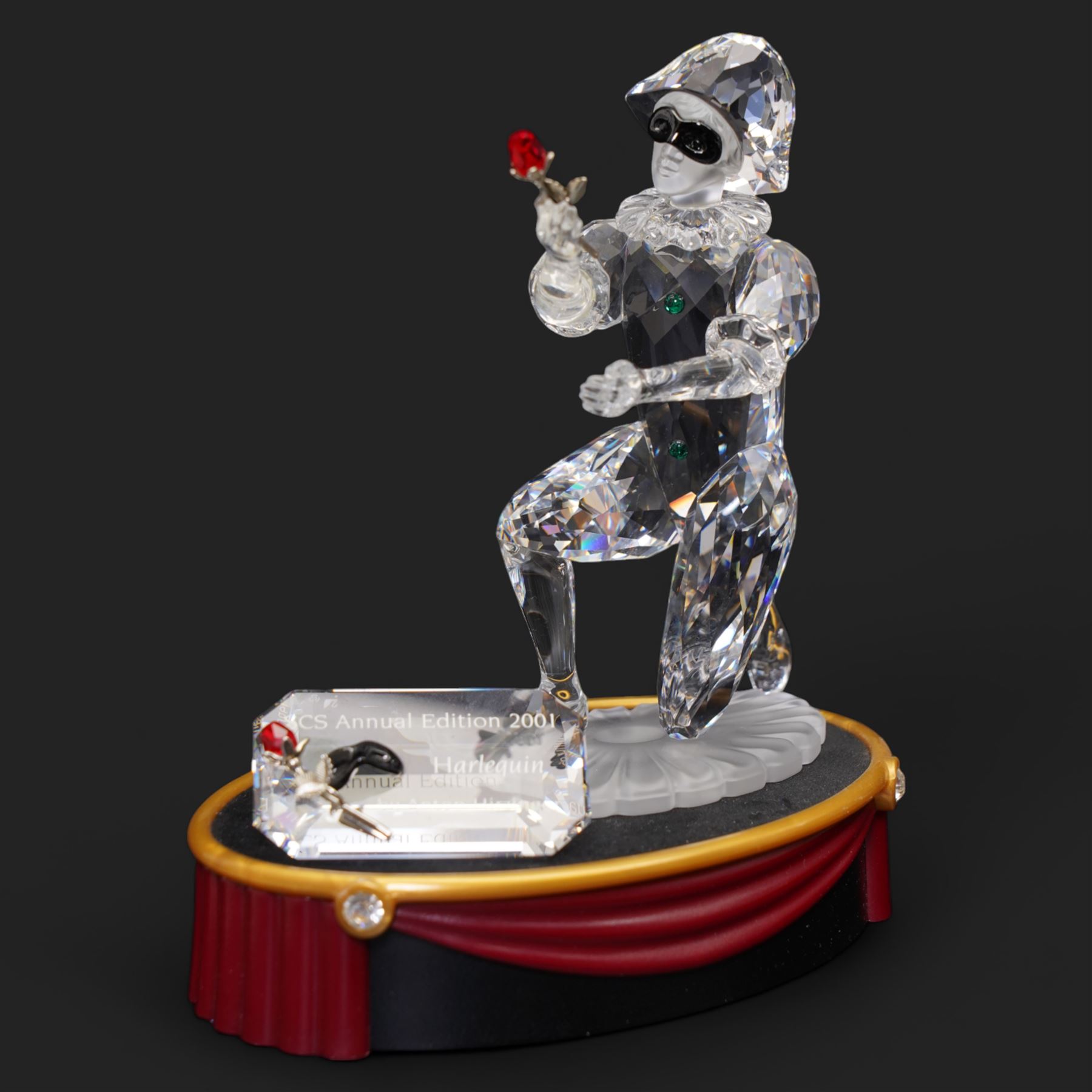 Swarovski crystal 'Masquerade' trilogy; 1999 Masquerade Pierrot, 2000 Columbine, 2001 Harlequin all with accompanying plaque, stand and original box