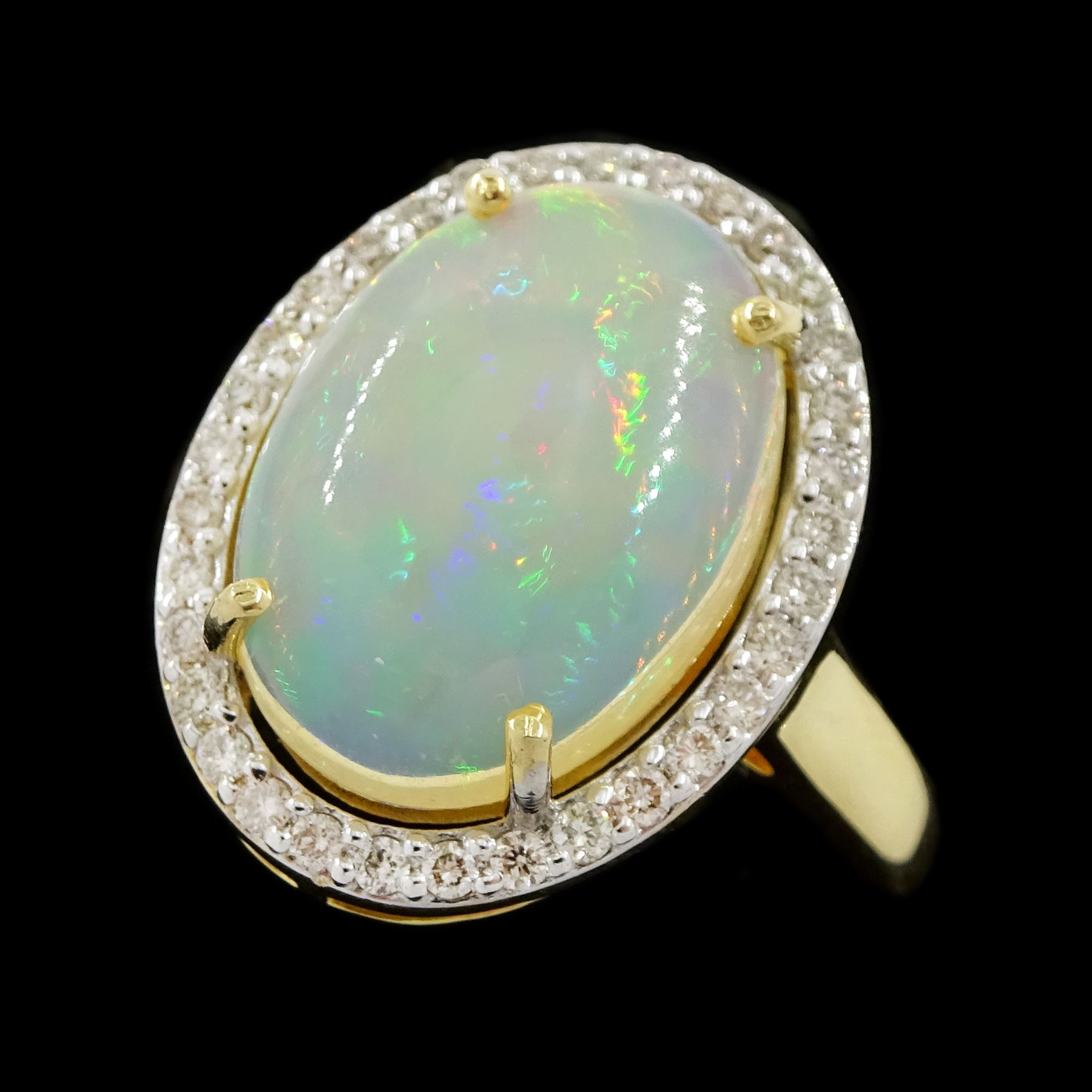 14ct gold opal and diamond cluster ring, single cabochon cut opal of approx 2.80 carat, with round brilliant cut diamond surround, stamped, total diamond weight approx 0.35 carat