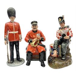 Three Royal Doulton figures comprising Past Glory HN2484, The Guardsman by William K Harper HN2784 and Drummer Boy HN2679, tallest H25cm