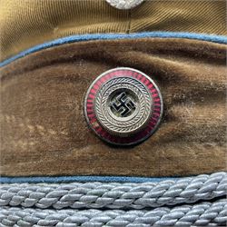 WW2 German Political Leaders brown cloth visor cap with metal insignia; labelled K. Hartel Weiden