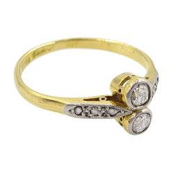 Early 20th century gold two stone old cut diamond ring, with diamond set shoulders, stamped 18ct Plat, total diamond weight approx 0.25 carat
