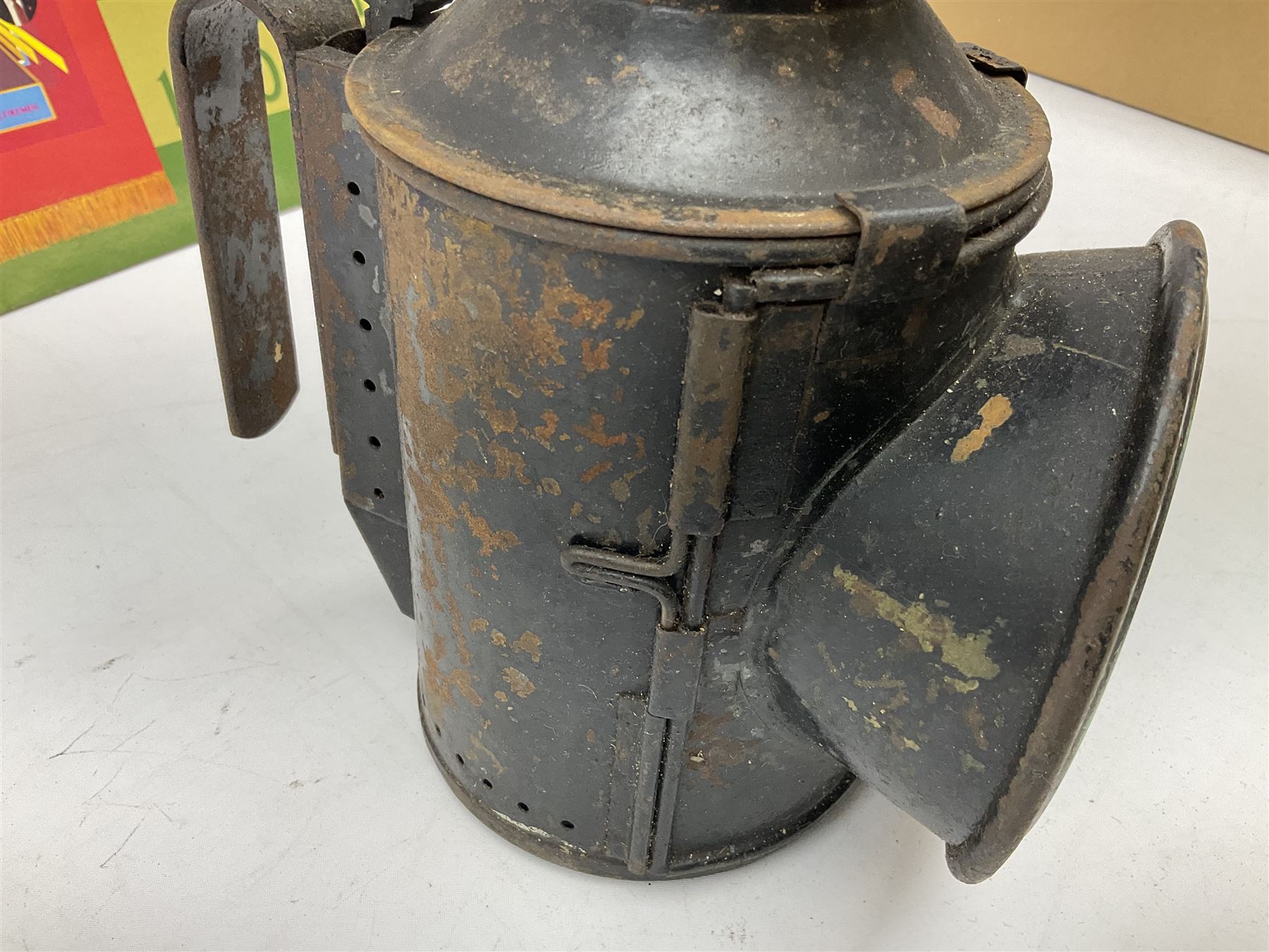 Black painted three colour railway lamp with revolving filters, H29cm; BR Acme Thunderer whistle; three railway peaked caps, two with BR Intercity 125 badge; small album of photographs of railway interest etc