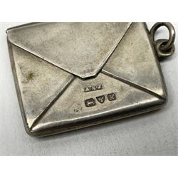 Silver stamp case modelled in the form of an envelope, together with a silver vesta case, each hallmarked, approximate total weight 20.5 grams
