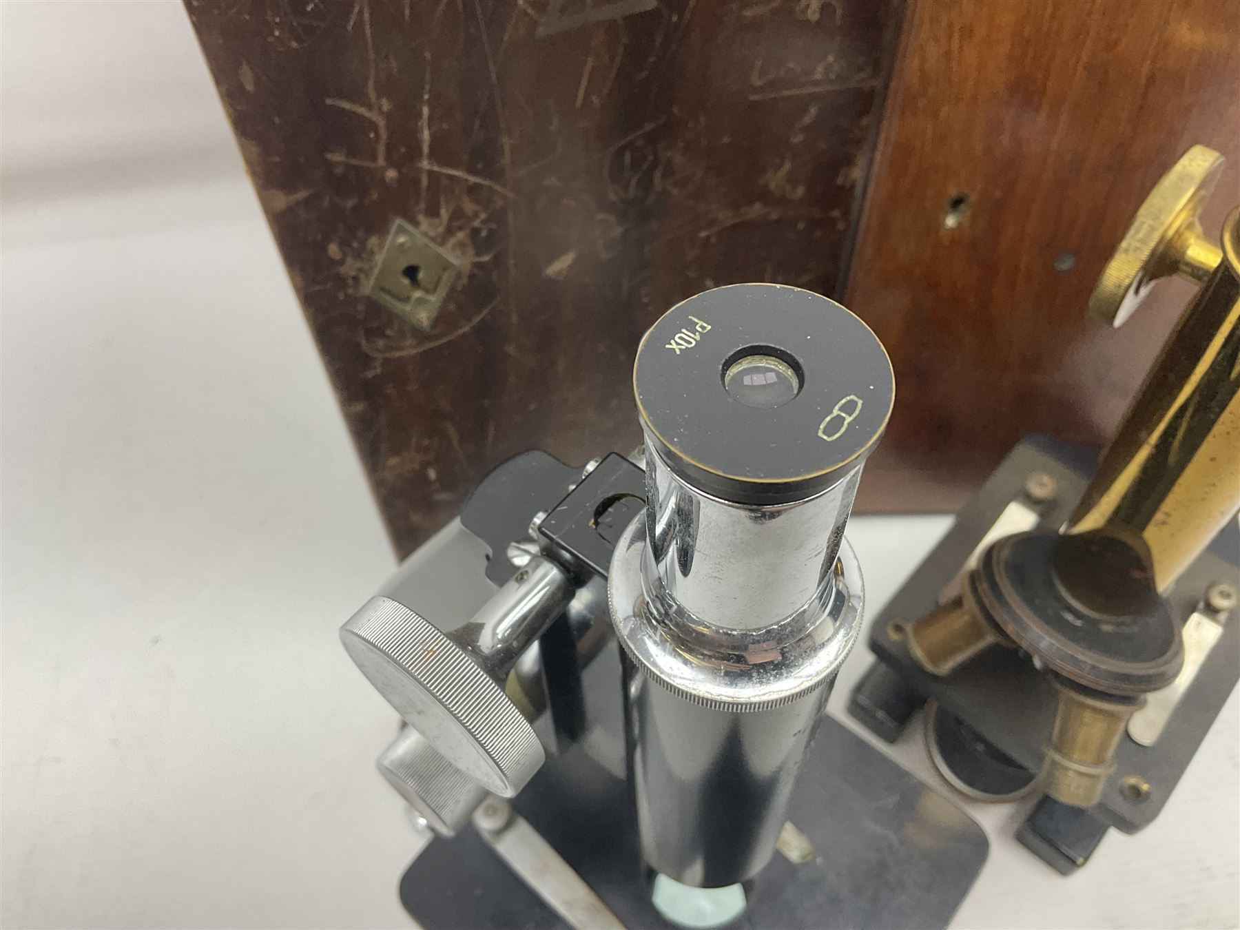 20th century W. Watson & Sons Kima microscope no. 118396 in original oak box, together with W. Watson & Sons Praxis microscope no. 18360, in original box  